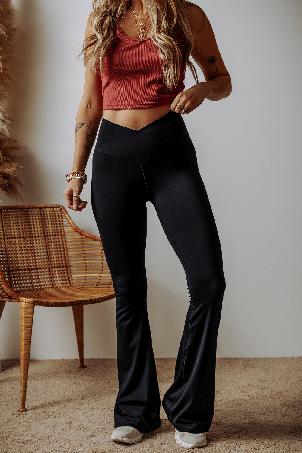 Black high waist, v-shape, flare leg leggings, front view